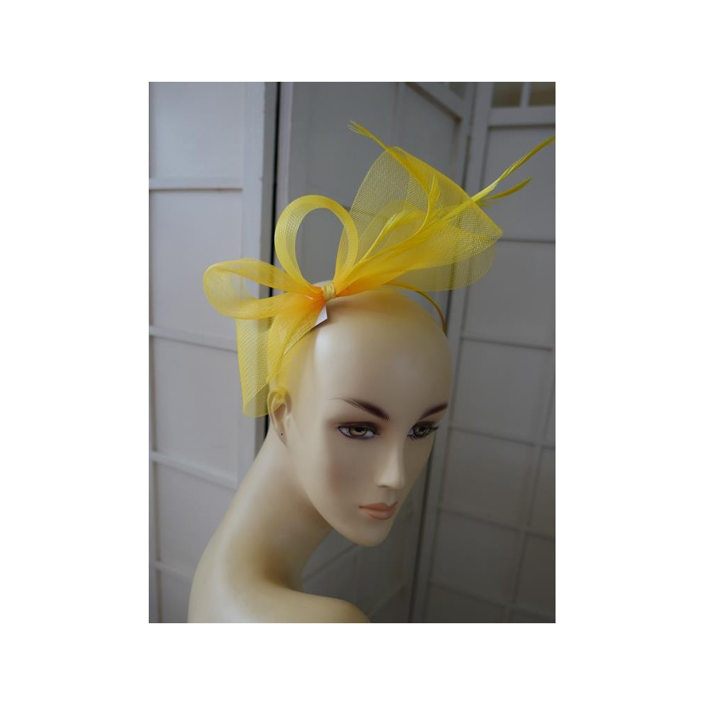Żółty z piórami fascynator opaska z crin
