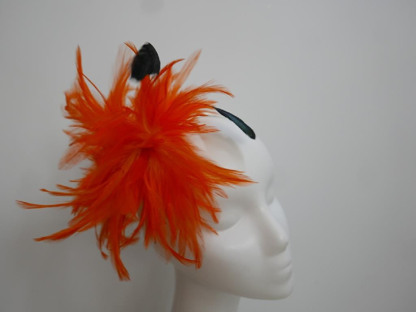 Pomarańczowe pióra stroik do włosów , sukni, kapelusza
