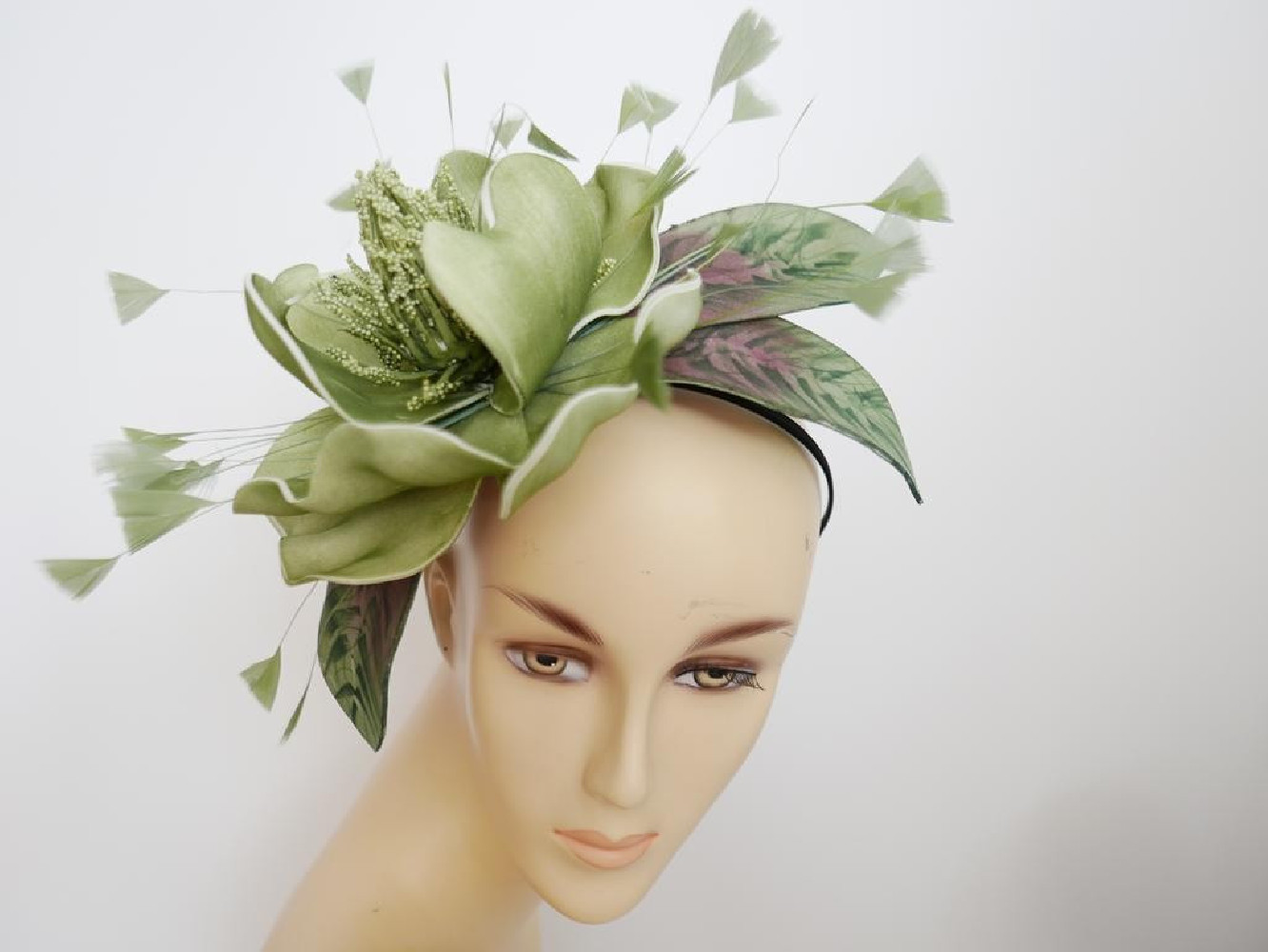 Zielony kwiat  fascynator  na opasce