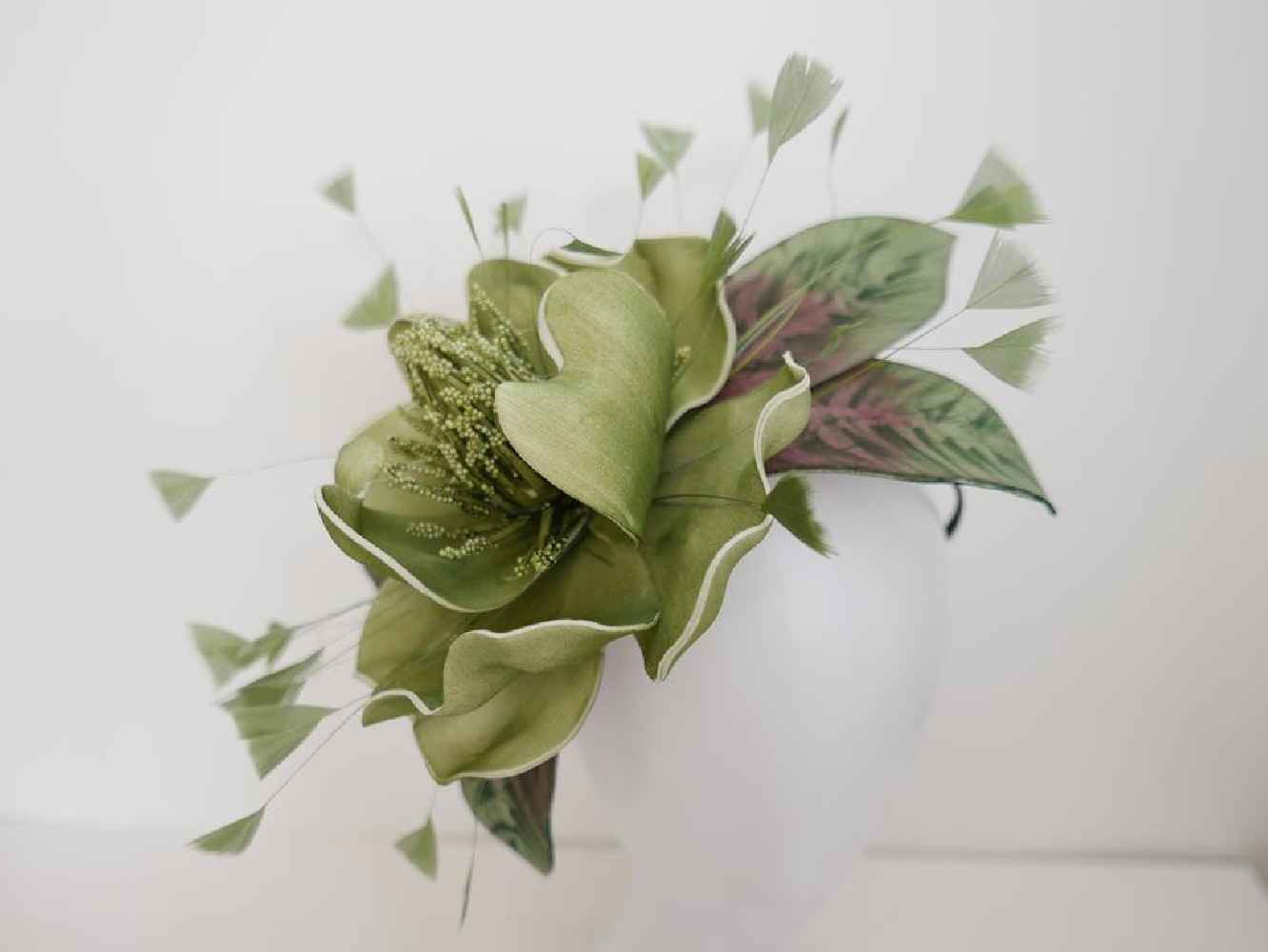 Zielony kwiat  fascynator  na opasce